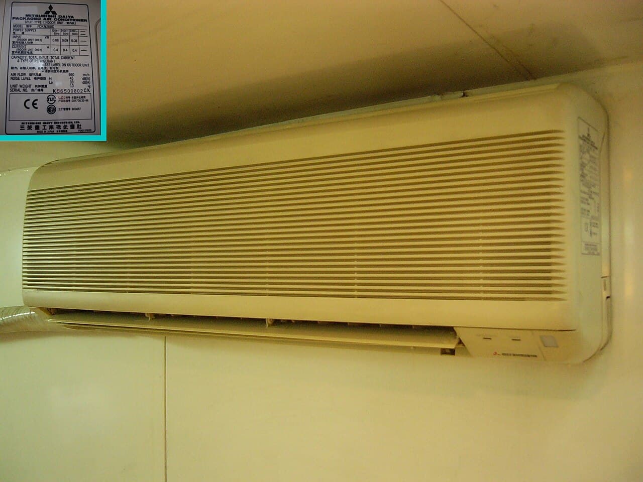 Ductless mini-split indoor head mounted high on an interior wall